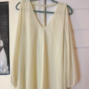 Ivory short dress with flower t-back design